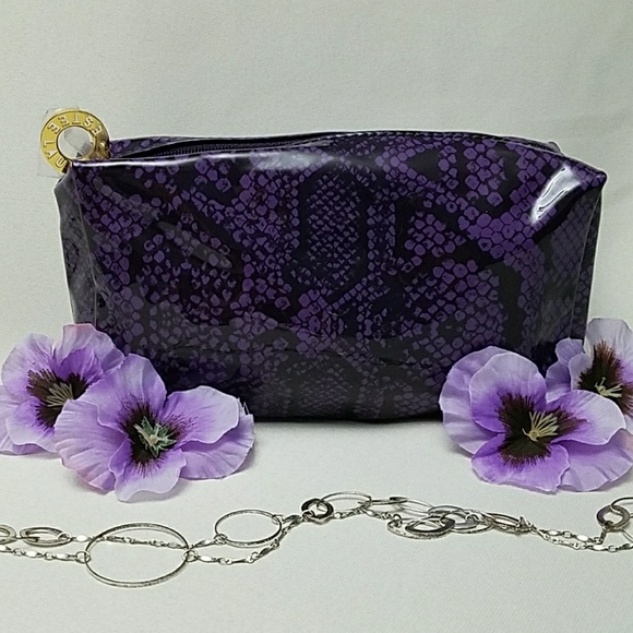 Estee Lauder Handbags - ESTEE LAUDER Purple & black snakeskin print bag